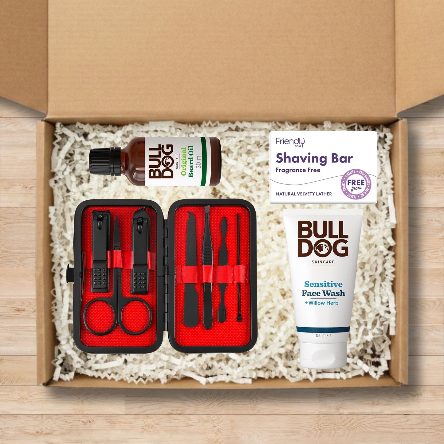 Grooming kit gift set including a nail clipper and grroming set, bull dog face wash, bull dog shaving bar, and bull dog beard oil