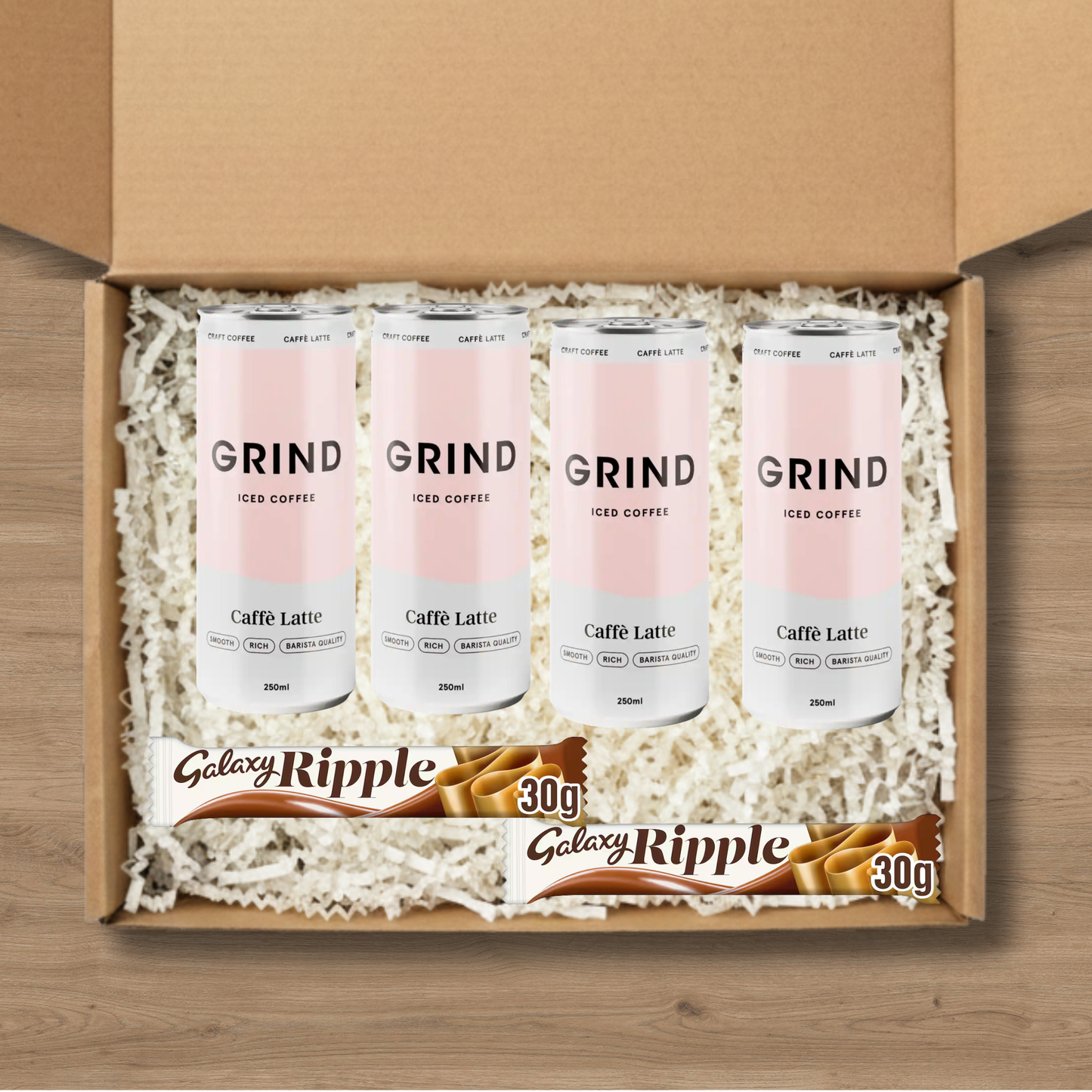 4 cans of Grind Caffe Latte Iced Coffee and 2 Galaxy Ripple chocolate bars
