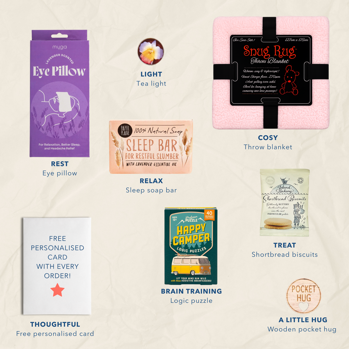 A collage of cosy gift items arranged on a light beige patterned background: An eye pillow by Myga, a tea light, a pink Snug Rug throw blanket, a sleep soap bar, a free personalised card, a green Happy Camper brain training box, and a wooden pocket hug.