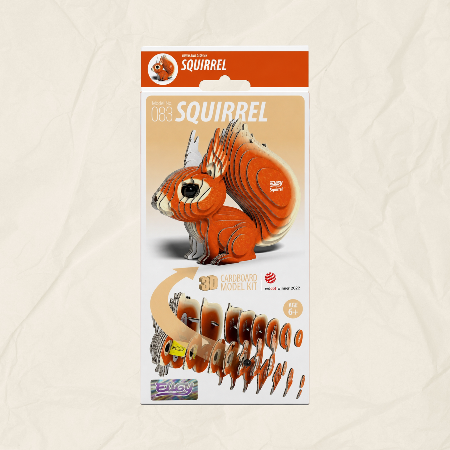A box containing a 3D wooden puzzle of a red squirrel.