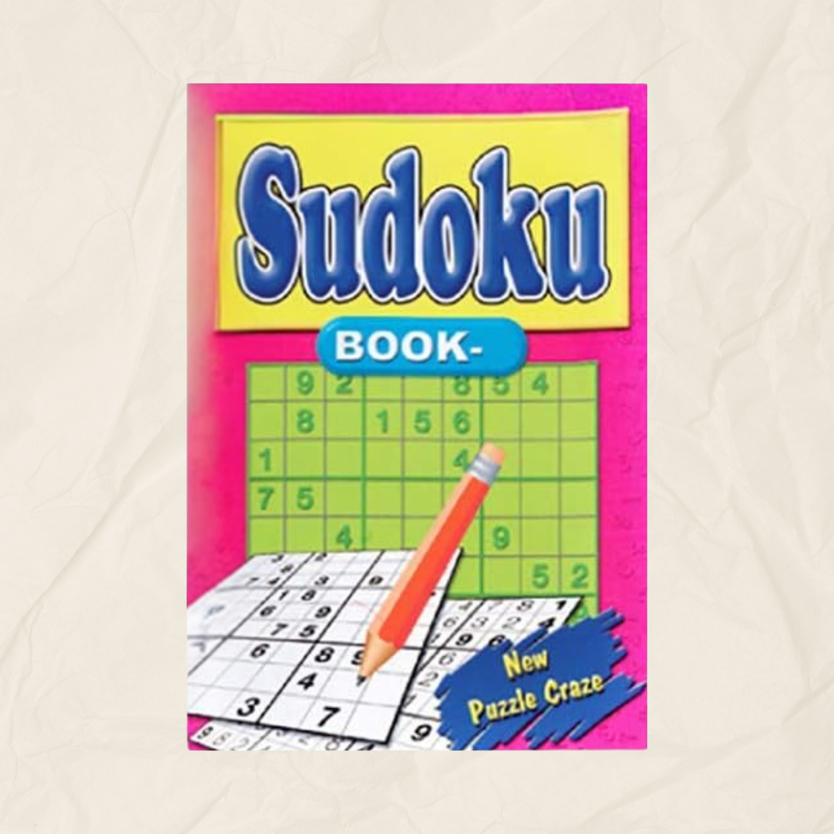A Pink and yellow Sudoku book by Brain Games