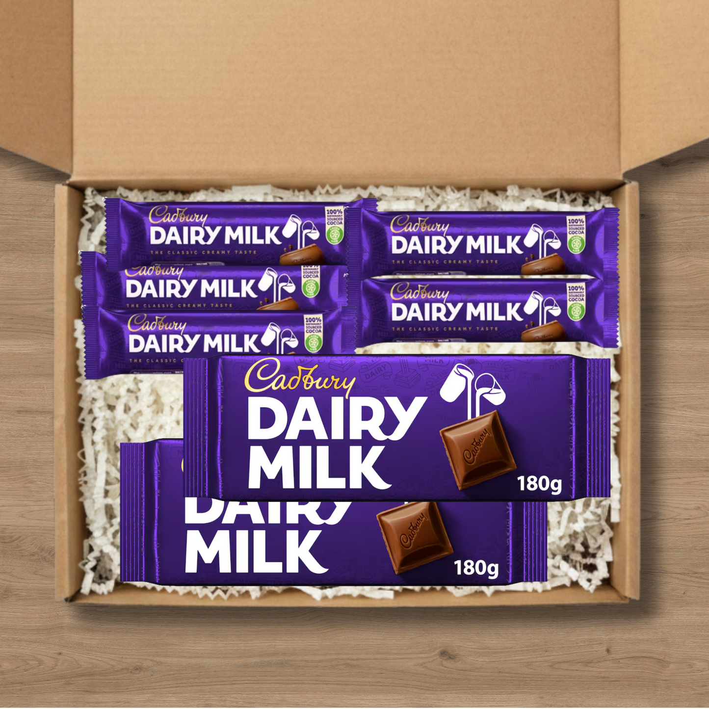 Cadbury Dairy Milk chocolate gift box with small bars and large 180g sharing bars