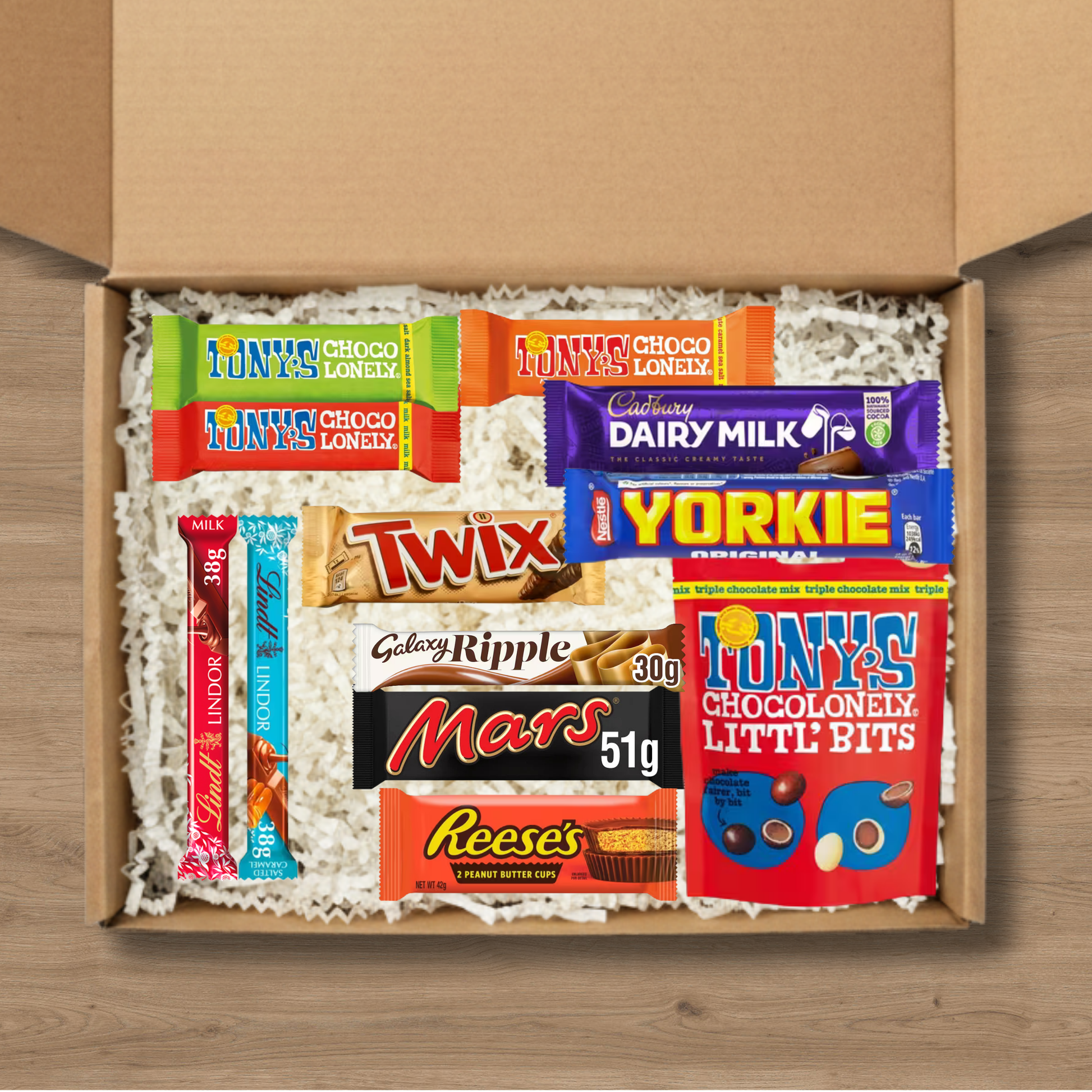 Mixed chocolate gift box with Tony's, Cadbury, Yorkie, Lindt, Twix, Mars, Galaxy and Reese's