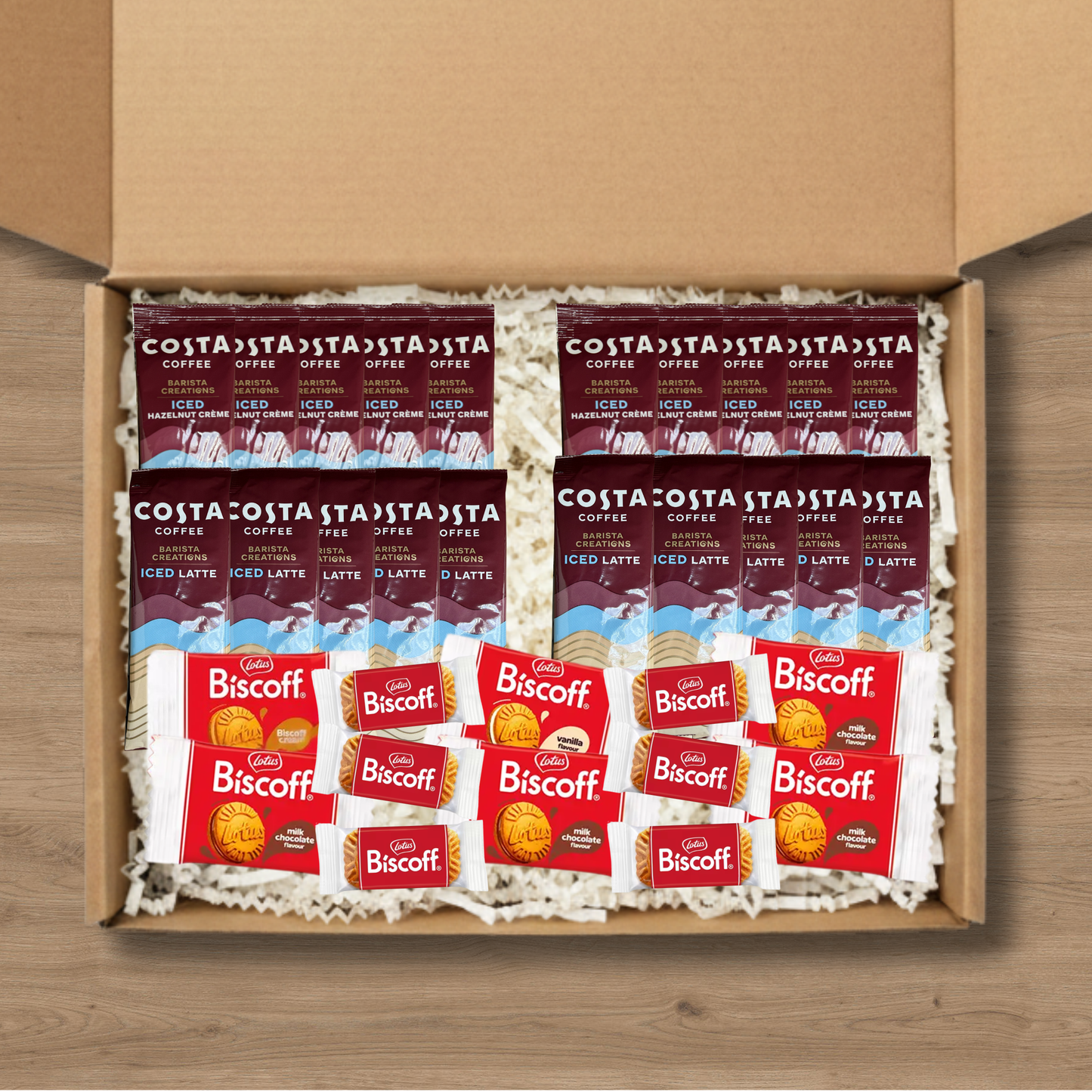 Gift box containing 5x Costa Coffee Iced Latte Coffee Sachets, 5x Costa Coffee Hazelnut Creme Iced Coffee Sachets, 3x Lotus Biscoff biscuits, 1x Lotus Biscoff Milk Chocolate Cream, 1x Lotus Biscoff Cream, and 1x Lotus Biscoff Vanilla Cream