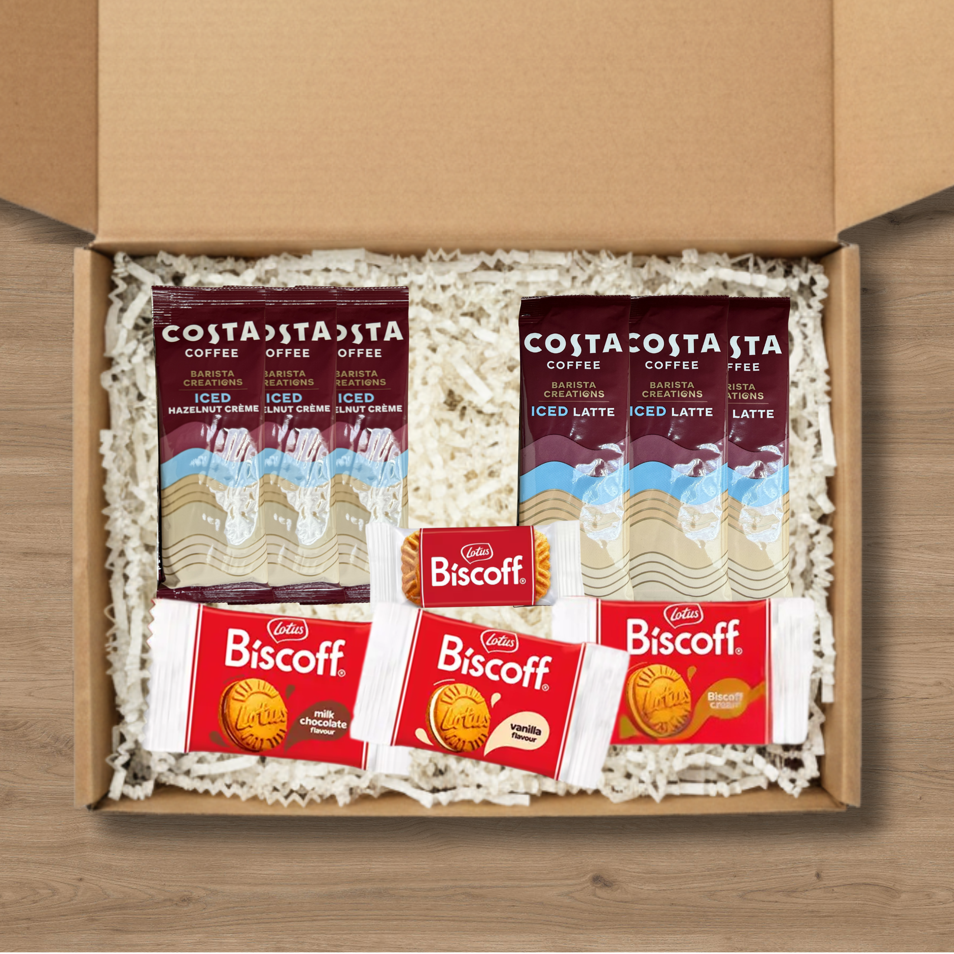 Gift box including 3x Costa Coffee Iced Latte Coffee Sachets, 3x Costa Coffee Hazelnut Creme Iced Coffee Sachets, 1x Lotus Biscoff biscuits, 1x Lotus Biscoff Milk Chocolate Cream, 1x Lotus Biscoff Cream, and 1x Lotus Biscoff Vanilla Cream