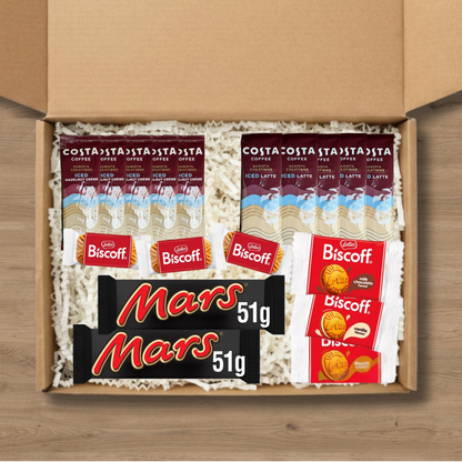 A gift box containing 5 costa coffee iced latte sachets, 5 costa coffee iced hazelnut creme coffee sachets, 3 packs of lotus biscoff biscuits, 1 pack each of lotus biscoff cream, biscoff vanilla cream, and biscoff milk chocolate cream biscuits, and 2 Mars chocolate bars