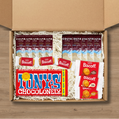 A gift box containing 5 costa coffee iced latte sachets, 5 costa coffee iced hazelnut creme coffee sachets, 3 packs of lotus biscoff biscuits, 1 pack each of lotus biscoff cream, biscoff vanilla cream, and biscoff milk chocolate cream biscuits, and a 180g Tony's Chocolonely milk chocolate bar