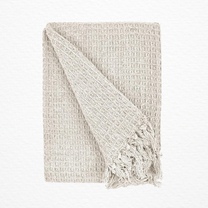 An Emma Barclay Honeycomb Throw folded over itself