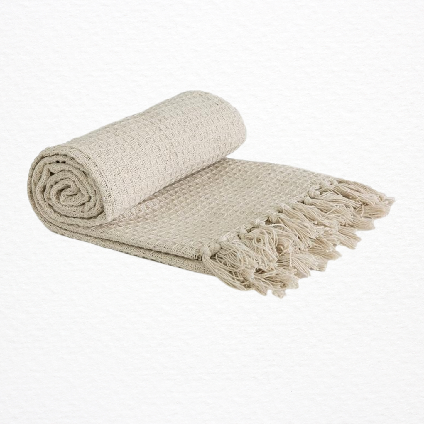 An Emma Barclay Honeycomb Throw rolled up