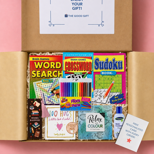 Gift box containing crossword, word search, sudoku and colouring books, a 100 Hugs book, a bookmark colouring felt tip pens, hand sanitiser, and a pocket hug