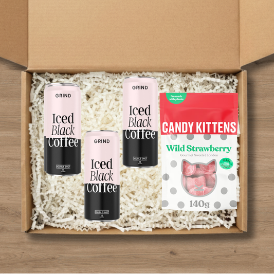 3 cans of Grind blacked iced coffee and 1 pack of Candy Kittens wild strawberry sweets.