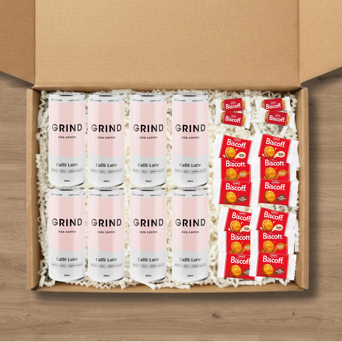 8 cans of Grind iced latte and a selection of Lotus Biscoff biscuits