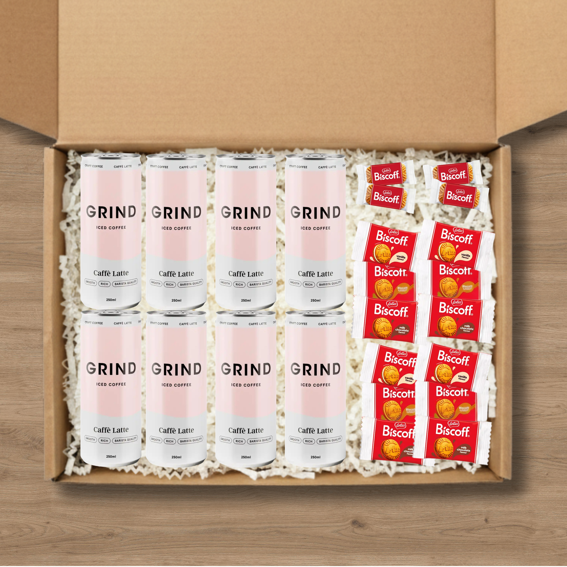 8 cans of Grind iced latte and a selection of Lotus Biscoff biscuits