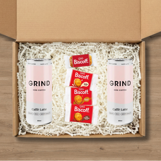 2 cans of Grind iced latte and a selection of Lotus Biscoff biscuits