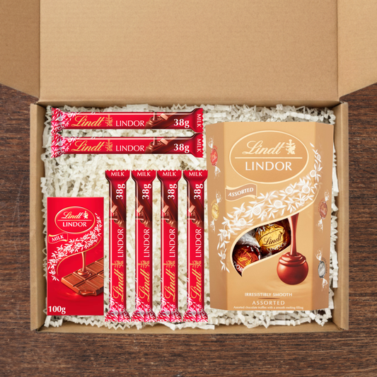 Gift box containing Lindt lindor cornets, lindt lindor chocolate bar and lindt lindor mini chocolate bars
