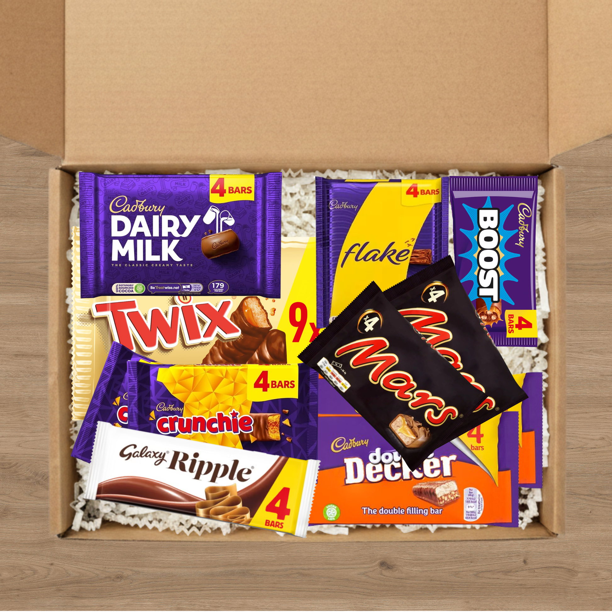 A sharing gift box of dairy milk, flake, boost, mars, twix, crunchie, double decker, and galaxy ripple bars