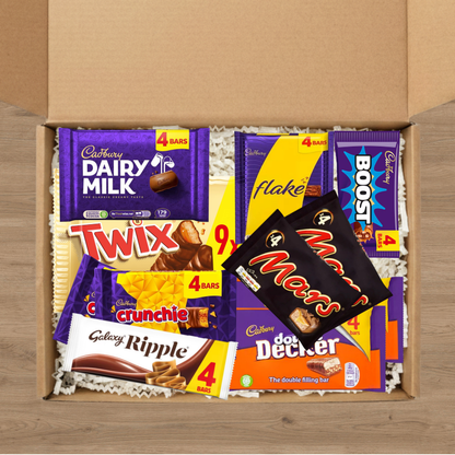 A sharing gift box of dairy milk, flake, boost, mars, twix, crunchie, double decker, and galaxy ripple bars