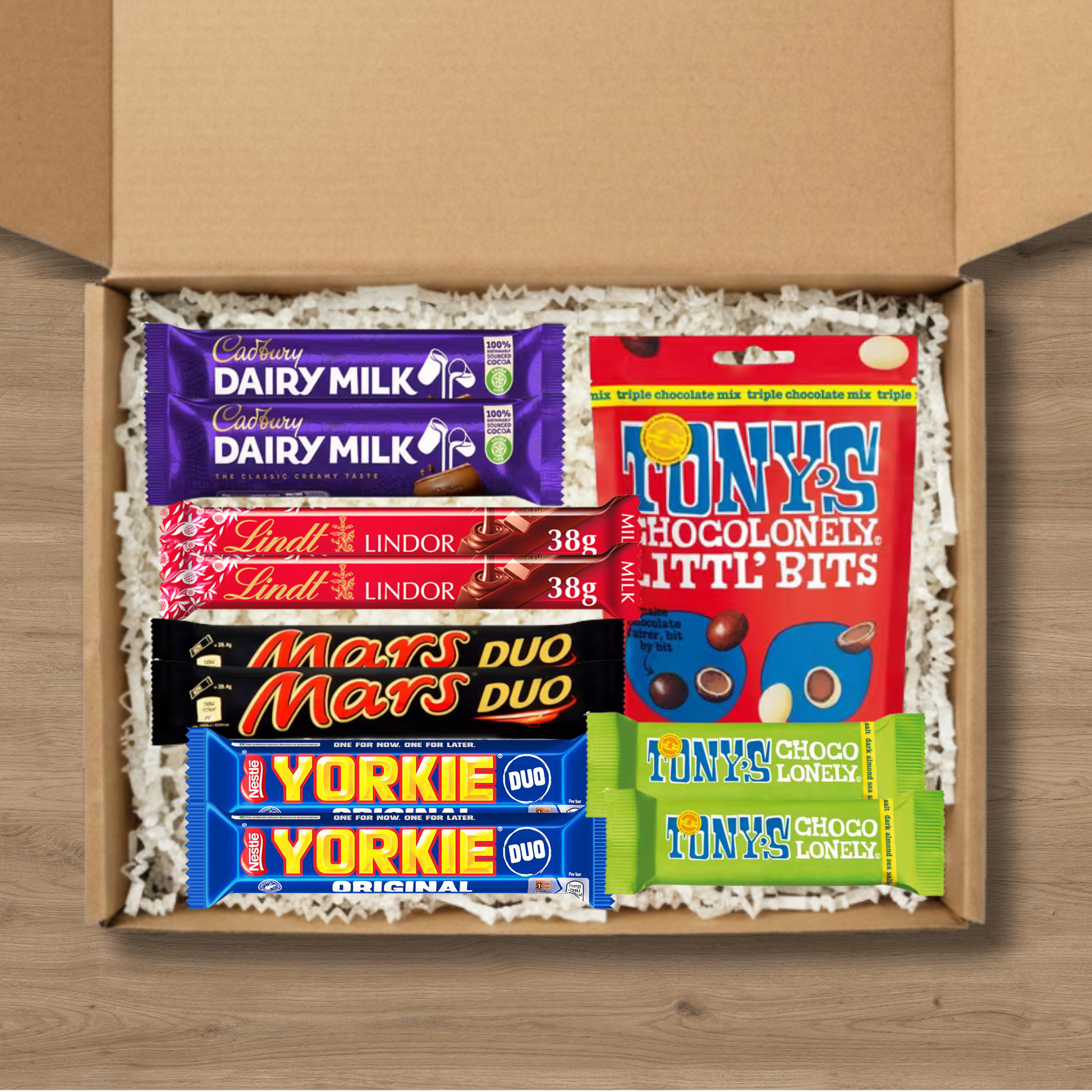 Mixed chocolate gift box with Cadbury Dairy Milk, Mars Duo, Yorkie, Lindt Lindor and Tony's Chocolonely