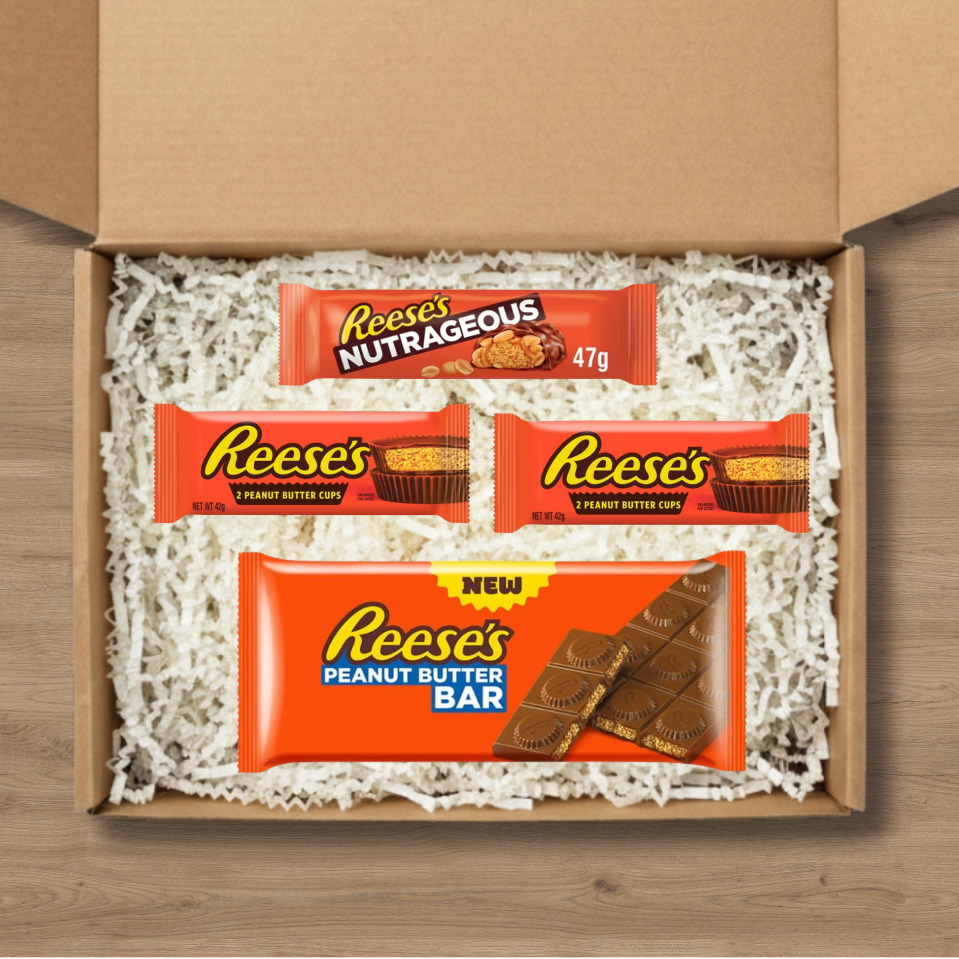 Small Reese's gift box with Peanut Butter Cups, a Nutrageous bar and Peanut Butter Bar