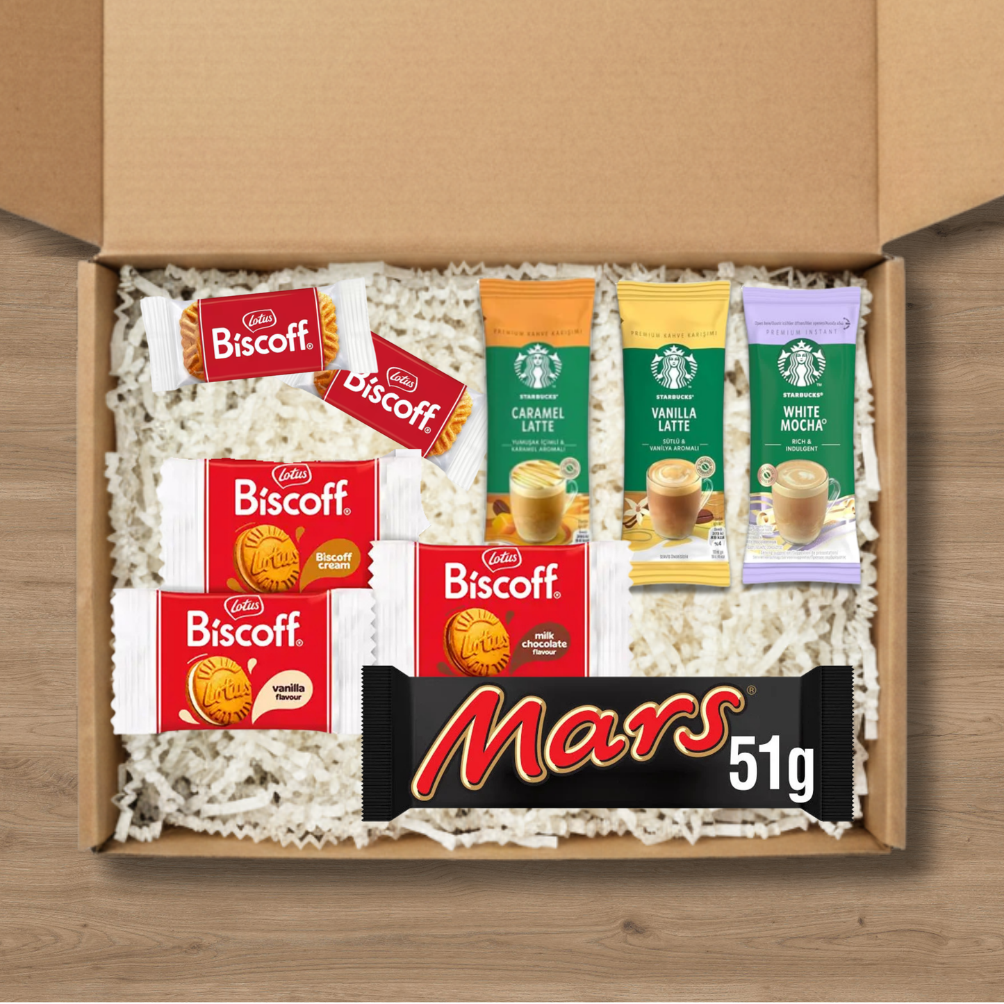 Coffee gift box with Starbucks lattes, Lotus Biscoff biscuits and a Mars bar