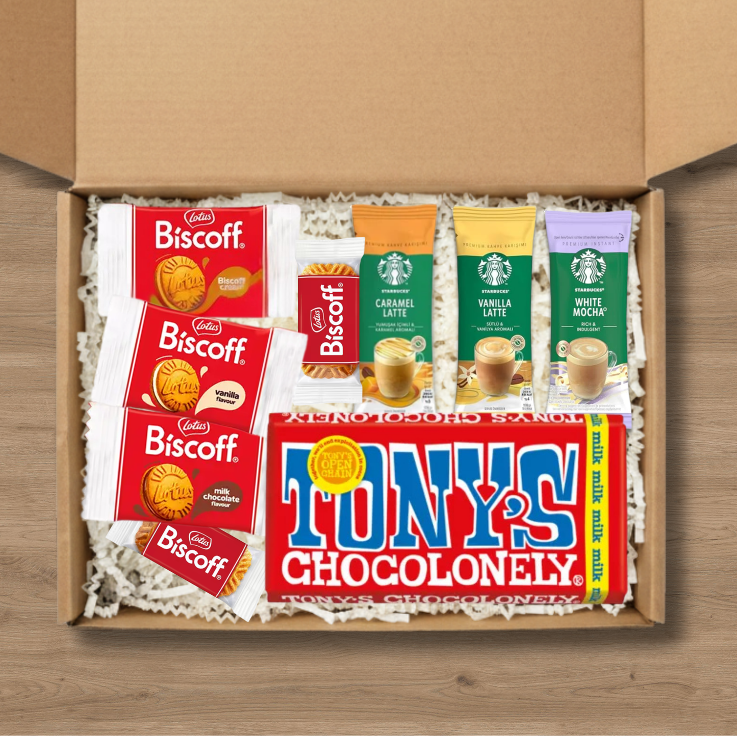 Coffee gift box with Starbucks lattes, Biscoff biscuits and Tony's Chocolonely milk chocolate bar